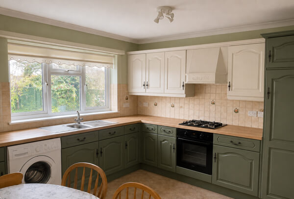 Functional kitchen after cupboard refurbishment and painting in Hatfield