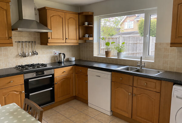 Brown kitchen cupboards before painting in Hatfield