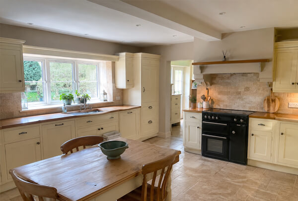 Kitchen cupboard edges and handle areas before painting in Hatfield