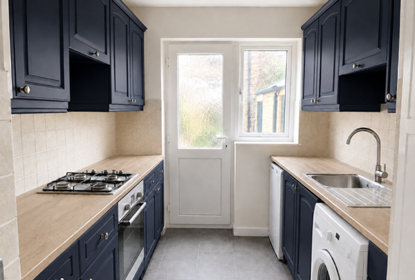 Warm stone painted kitchen cupboards after refurbishment in Hatfield