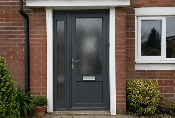 Aluminium front door in Northampton after painting, with a cleaner and more polished appearance