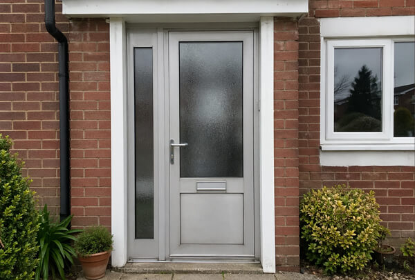 Aluminium front door in Northampton before painting, with a dull and dated finish
