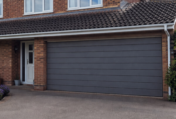 The same aluminium garage door after a colour refresh