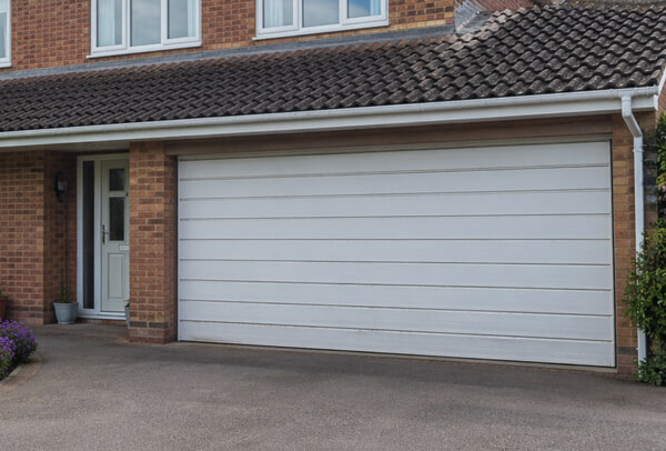 Aluminium garage door with a dull finish before painting