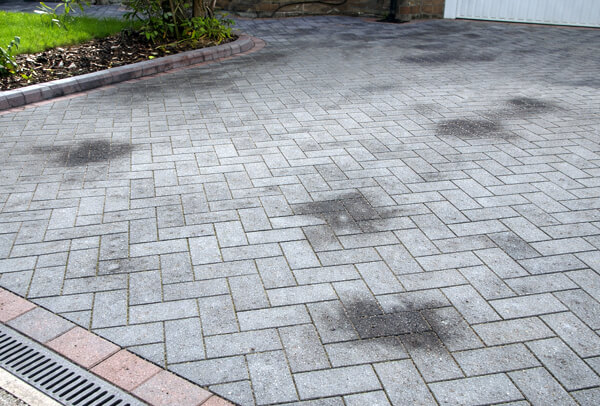 Block paving driveway before cleaning in Milton Keynes