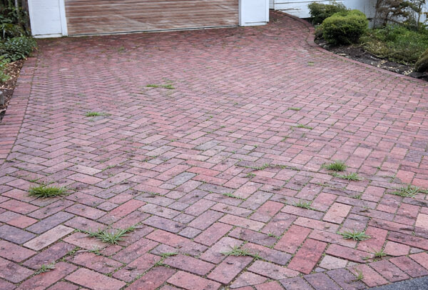 Brick driveway before cleaning in Milton Keynes