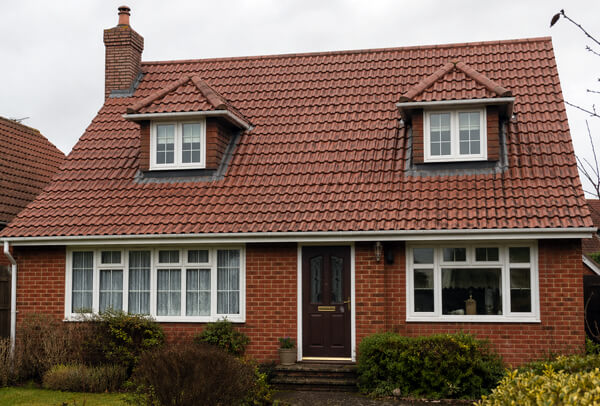 Clay tile roof in Northampton after cleaning, with a fresher and better-maintained appearance