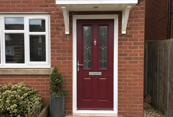 Composite front door in Northampton after painting, with a smarter and more modern appearance