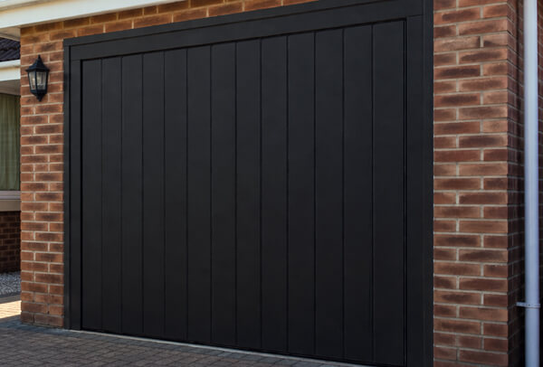 The same composite garage door after a fresh finish