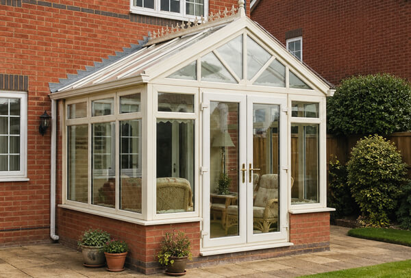 Conservatory in Luton before professional spraying with frames ready for preparation