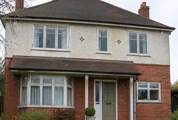 House window frames in Luton before painting with a tired exterior appearance
