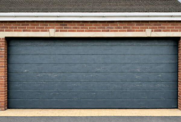 Garage door before painting in Milton Keynes