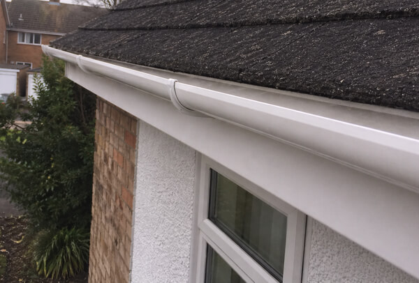 Gutters in Northampton after cleaning and exterior washing, with a neater roofline