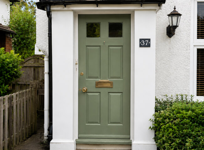 Front door after painting with a smart clean finish following a photo quote