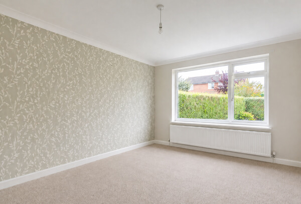 Interior room in Luton after decorating with fresh walls, clean woodwork and a brighter finish
