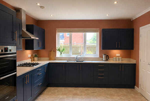 Kitchen in Luton after cupboard painting and decorating with refreshed units and walls