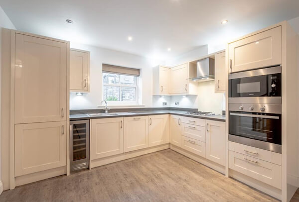 Kitchen cupboard repainting before painting in Milton Keynes