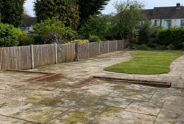 Block paving patio before cleaning and re-sanding in Milton Keynes