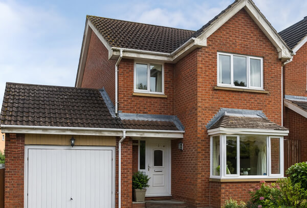 Roofline in Northampton before repainting, with surfaces that look tired and dated