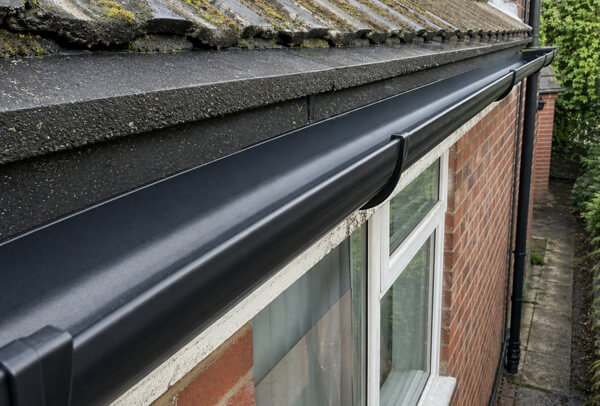 Gutters in Northampton after cleaning, cleared and working properly