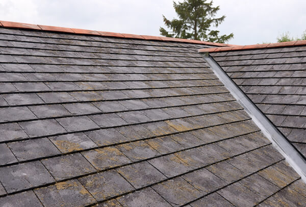 Slate roof before cleaning in Milton Keynes