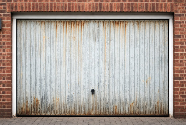 Steel garage door before painting in Milton Keynes
