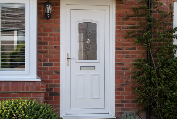 uPVC front door in Northampton before painting, with a dated and faded finish