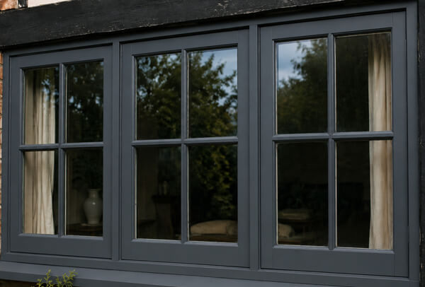 Timber window frames after preparation and repainting in Kettering