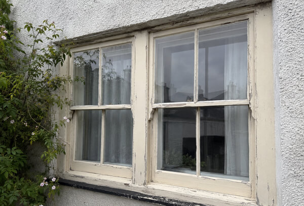 Existing window frames before suitability check in Hatfield