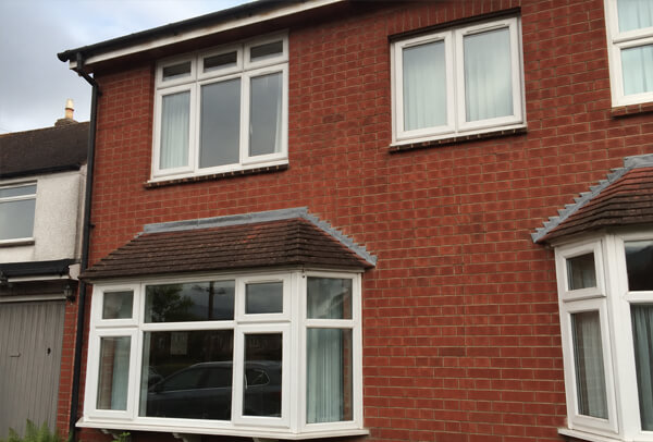 Plain exterior window frames before painting in Hatfield