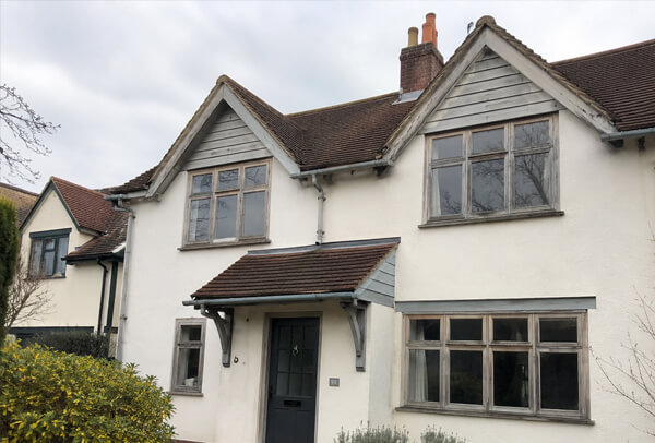 Character timber windows before repainting in Bicester