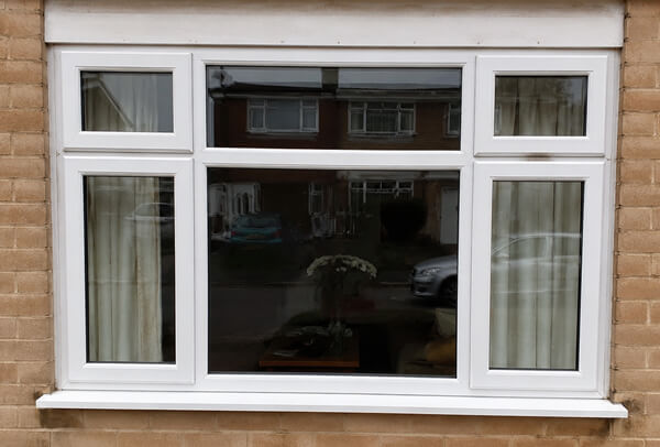 uPVC window frames before a new exterior finish in Bicester