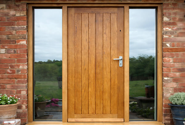 Wooden front door before painting in Milton Keynes