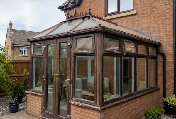 Conservatory shown in photos before frame painting advice in Bicester