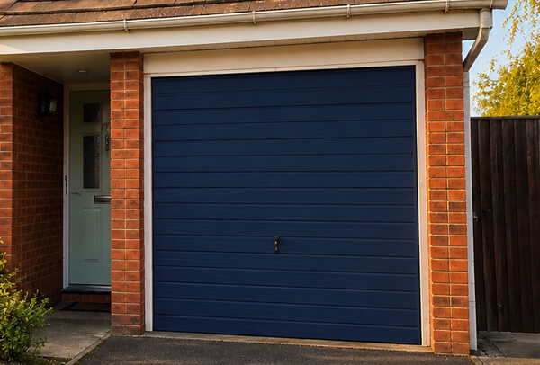 Side hinged garage doors after painting in Wellingborough