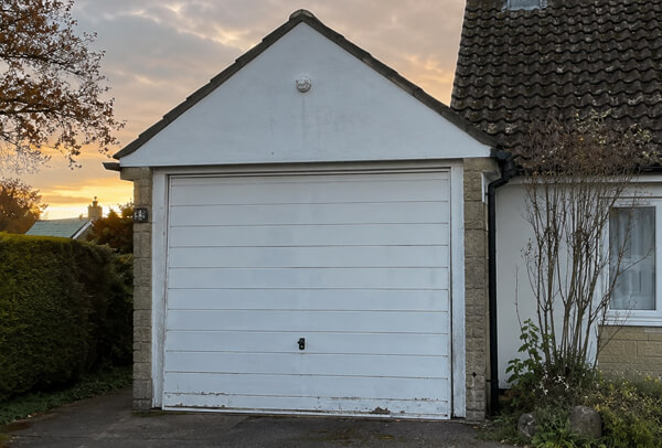Garage door details before painting in Wellingborough