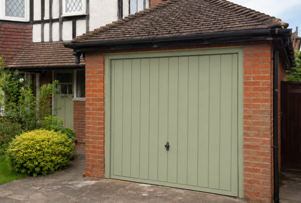 Weathered garage door after careful preparation and painting in Kettering