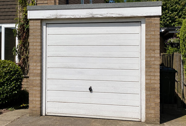 Sound garage door before repainting in Kettering