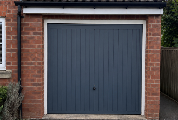Garage door after a deep green colour change in Aylesbury