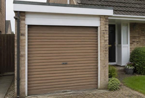 Large garage door before painting in Aylesbury