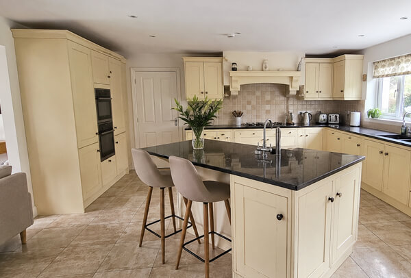 Dark kitchen cupboards before colour planning in Kettering