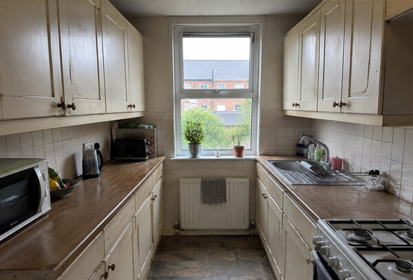 Tired oak kitchen cabinets before painting in Kettering