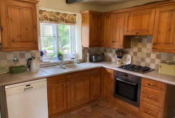 Lived in kitchen before cupboard refurbishment in Kettering