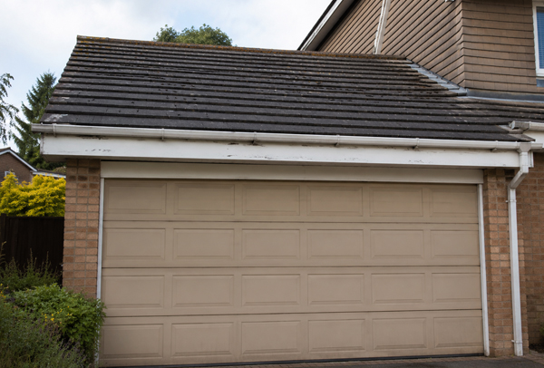 Front of property in Hatfield before garage door and roofline painting