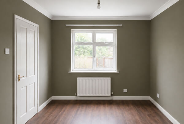 Room in Kettering after decorating with fresh walls ceiling and woodwork