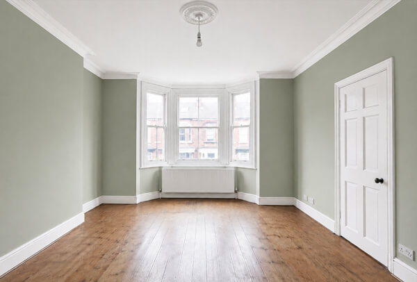 Room in Kettering before painting and decorating with tired walls and worn interior woodwork