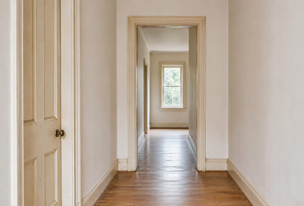 Interior woodwork in Kettering before painting with marked skirting boards and door frames
