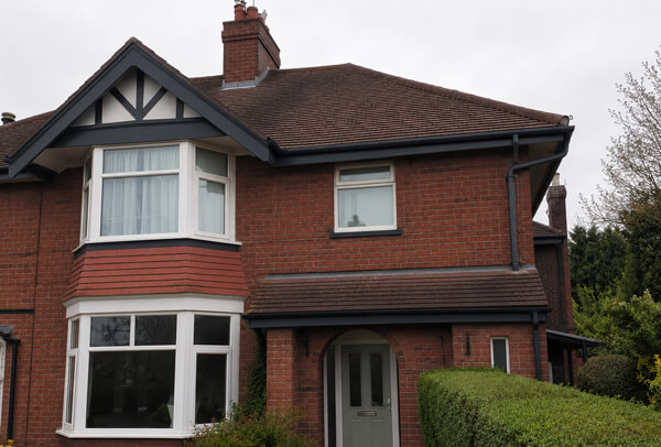 Exterior trim after painting in Wellingborough with roofline colour matched to the home