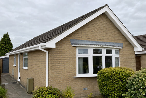 Soffit bargeboard and guttering after painting in Wellingborough
