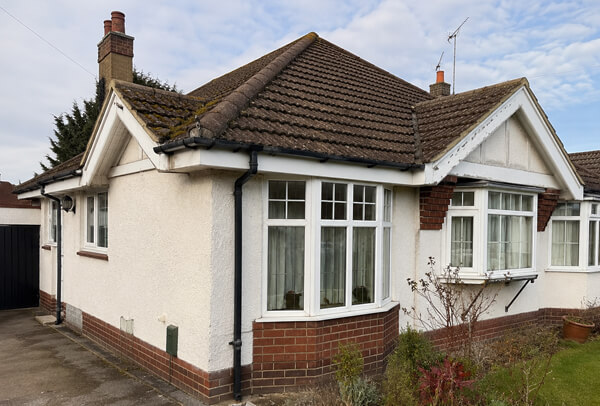 Bargeboards gutters and downpipes before painting in Kettering
